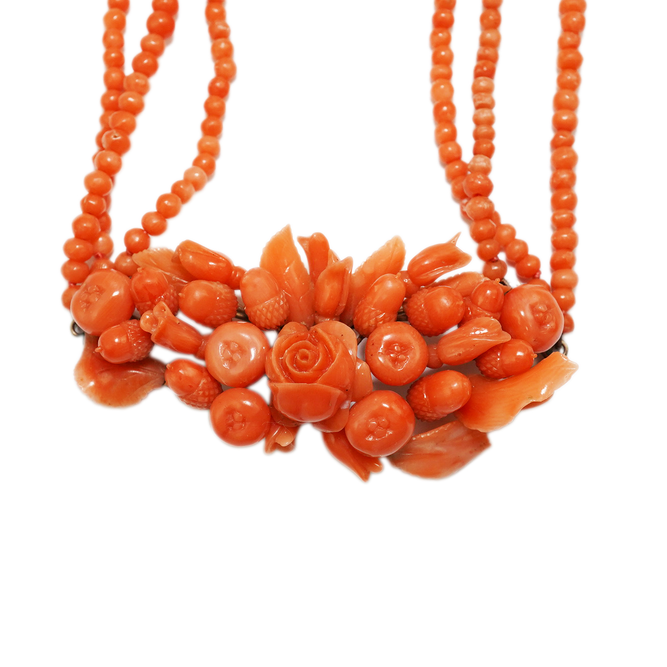 A late Victorian triple strand coral bead necklace